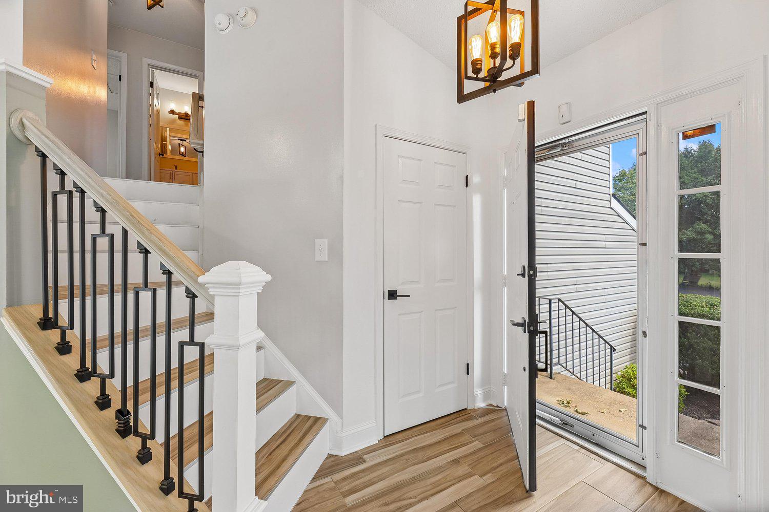 15764 Beau Ridge Drive Woodbridge, VA 22193 - Photo 2 of 58 a view of staircase with railing and a stairs
