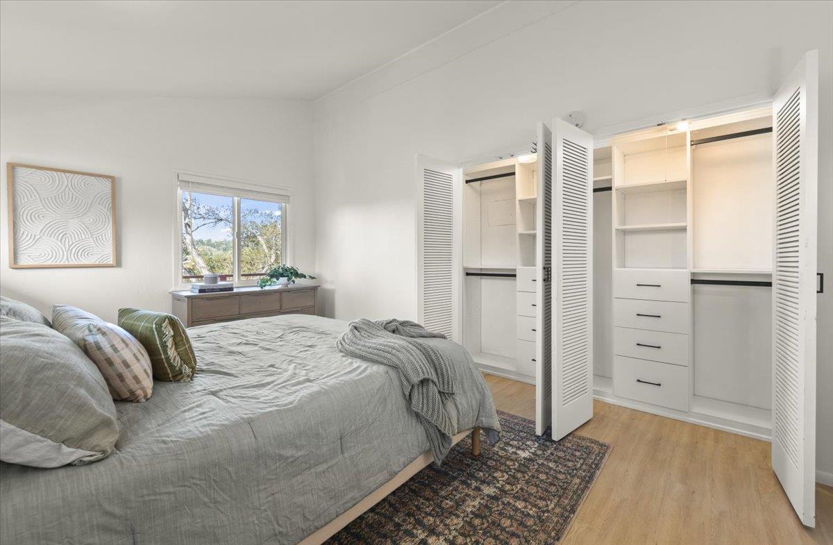 2715 Lafayette Street Soquel, CA 95073 - Photo 18 of 53 a bedroom with a bed and a walk in closet