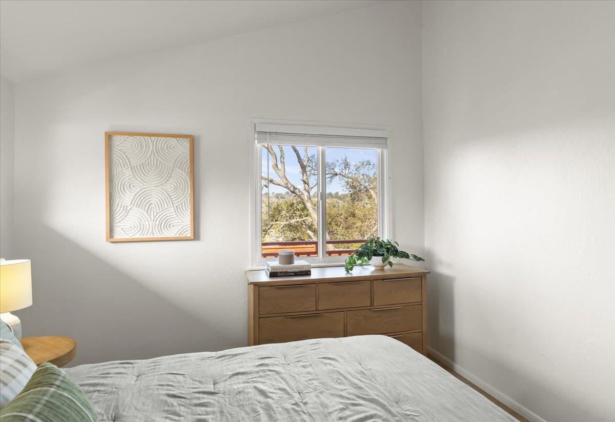 2715 Lafayette Street Soquel, CA 95073 - Photo 19 of 53 a bedroom with a bed and window