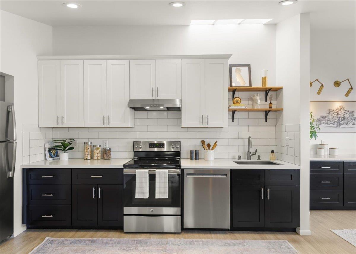 2715 Lafayette Street Soquel, CA 95073 - Photo 2 of 53 a kitchen with stainless steel appliances a sink stove and cabinets