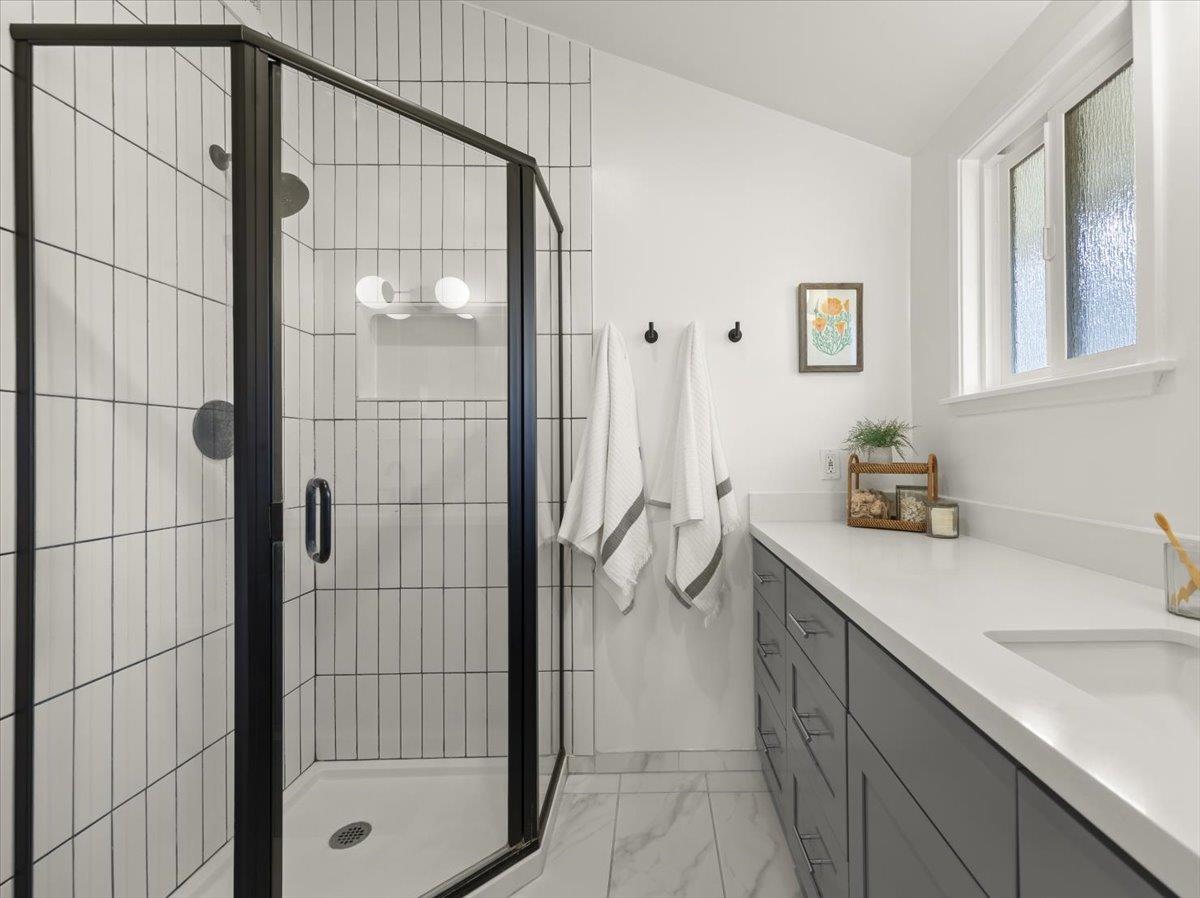 2715 Lafayette Street Soquel, CA 95073 - Photo 23 of 53 a bathroom with a sink and mirror