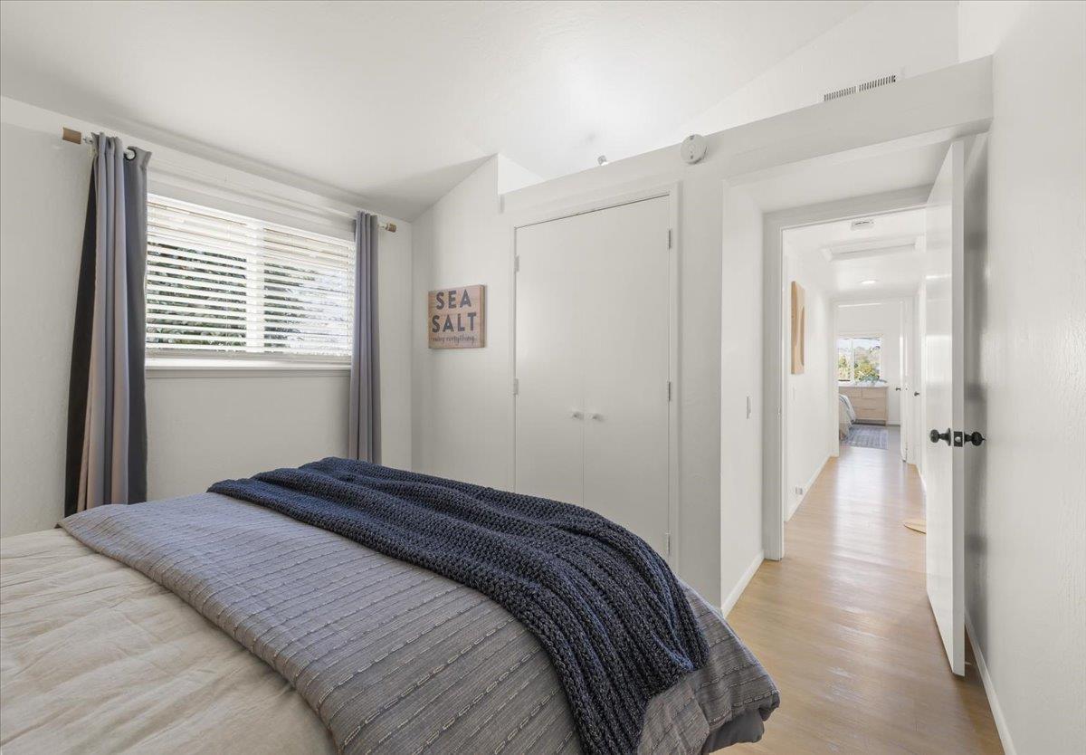 2715 Lafayette Street Soquel, CA 95073 - Photo 27 of 53 a bedroom with a bed and a window