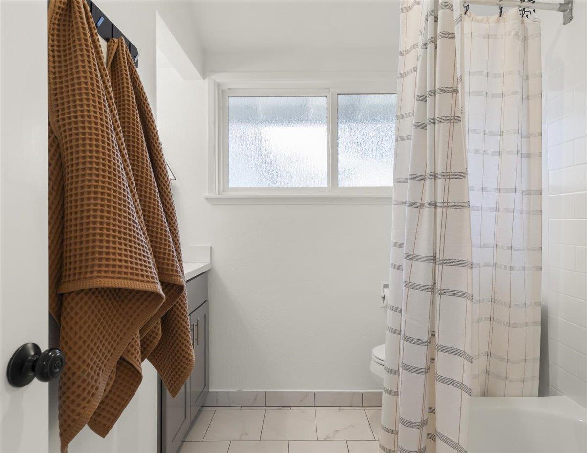 2715 Lafayette Street Soquel, CA 95073 - Photo 28 of 53 a bathroom with a toilet and a shower