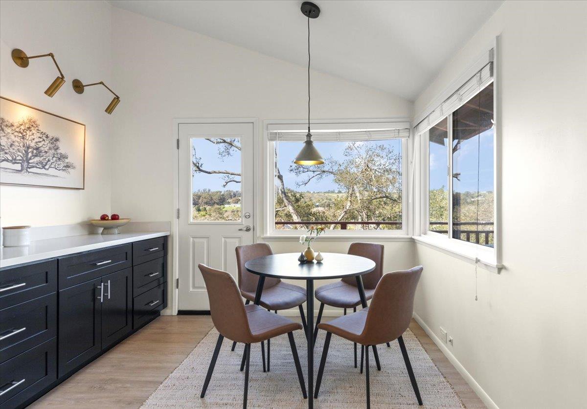 2715 Lafayette Street Soquel, CA 95073 - Photo 6 of 53 a dining room with furniture a rug and a painting