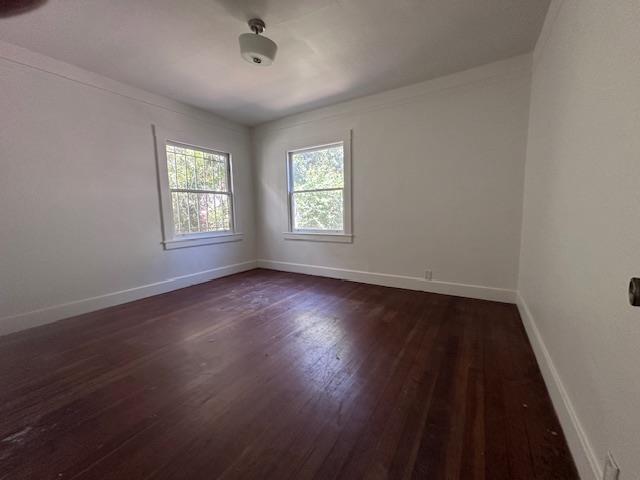 453 Grand Avenue South San Francisco, CA 94080 - Photo 6 of 9 an empty room with wooden floor and windows