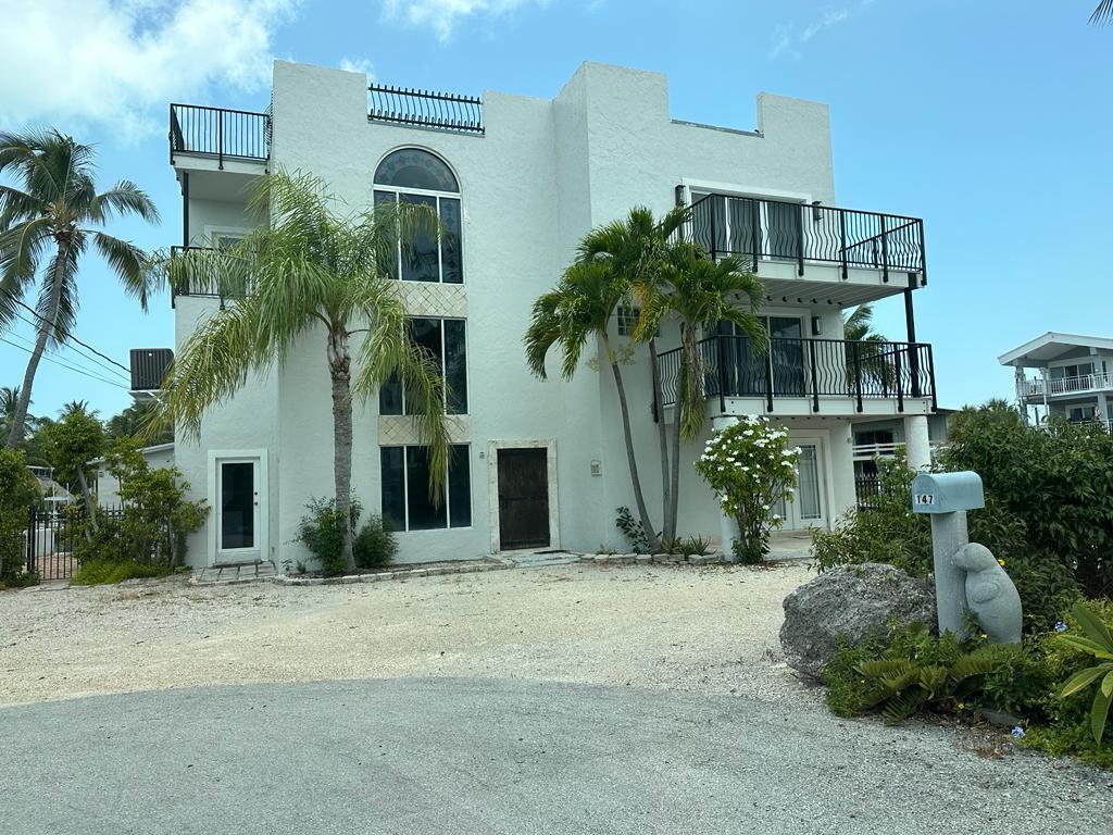 147 Redwing Road Tavernier, FL 33070 - Photo 1 of 11 PHOTO-2023-07-22-14-14-02 5