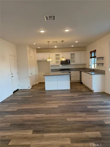 a view of kitchen and kitchen island