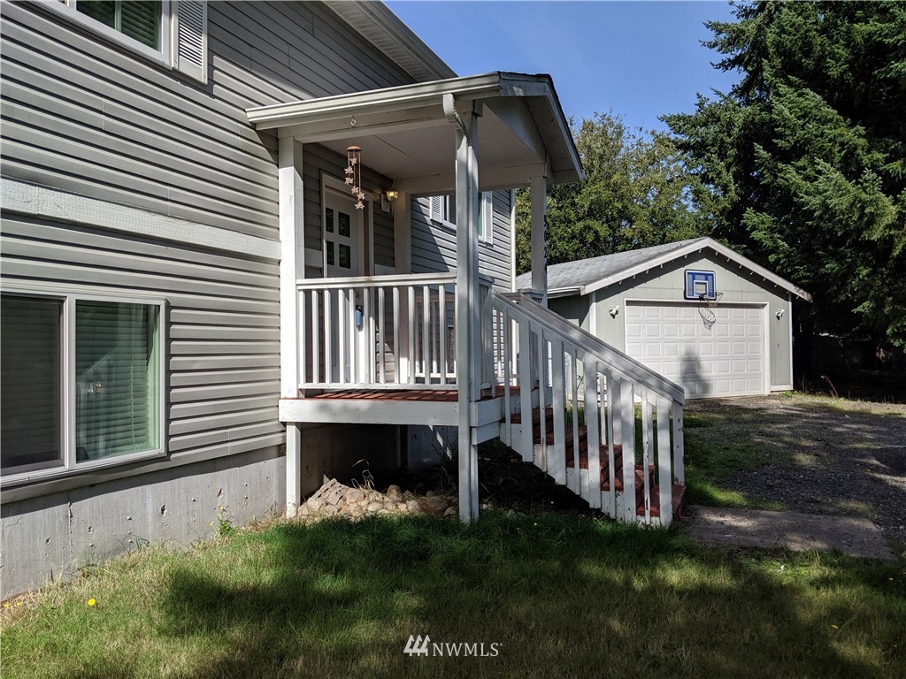 9024 176th Avenue Southwest Rochester, WA 98579 - Photo 1 of 25 a view of backyard of house
