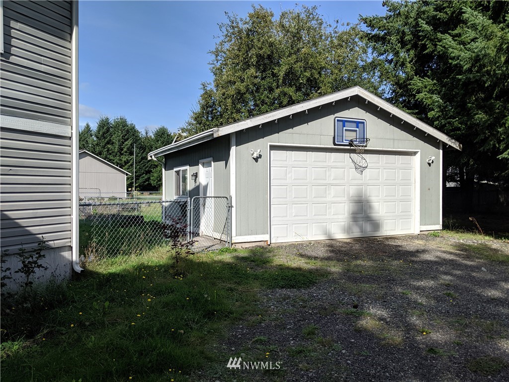 9024 176th Avenue Southwest Rochester, WA 98579 - Photo 17 of 25 a view of a back yard of the house