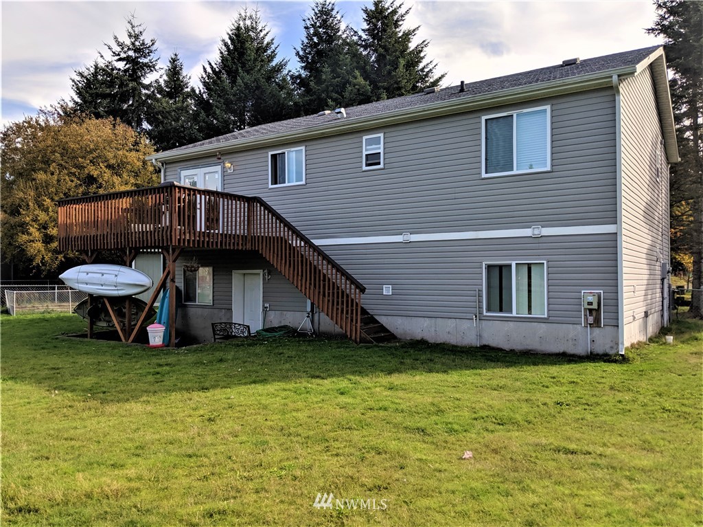 9024 176th Avenue Southwest Rochester, WA 98579 - Photo 19 of 25 a view of a house with a yard