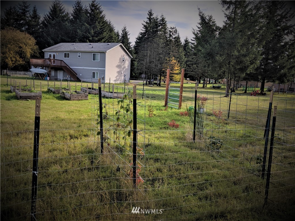 9024 176th Avenue Southwest Rochester, WA 98579 - Photo 21 of 25 a view of a house with backyard
