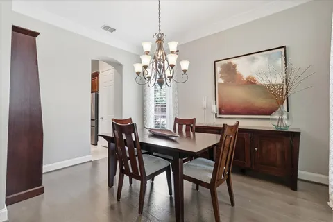 a work room with furniture and window