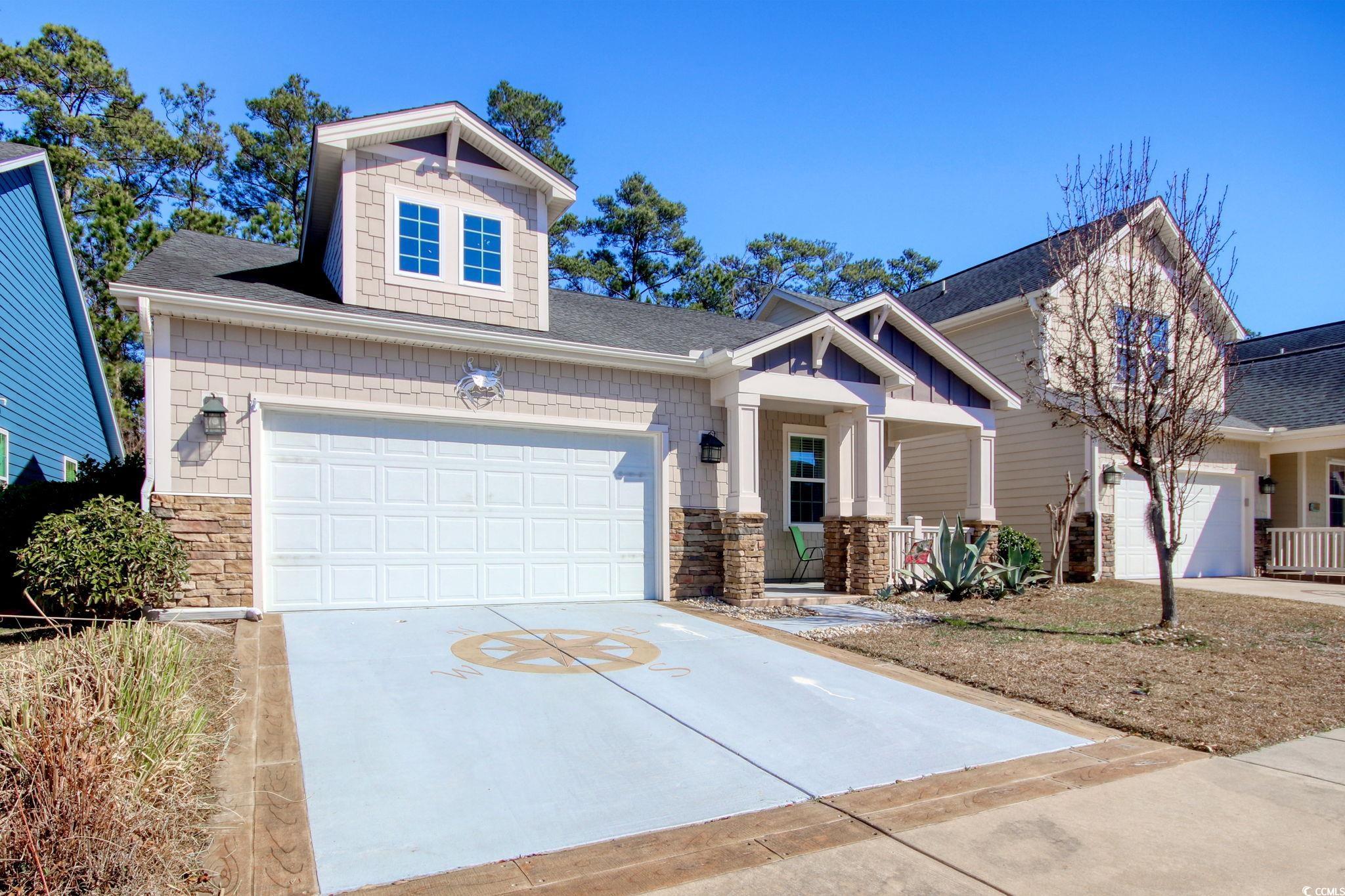 1878 Heritage Loop Myrtle Beach, SC 29577 - Photo 2 of 40 Craftsman house featuring covered porch, stone sid