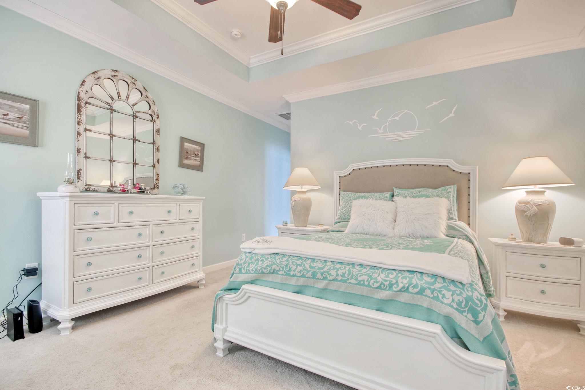 1878 Heritage Loop Myrtle Beach, SC 29577 - Photo 26 of 40 Bedroom with a raised ceiling, light carpet, crown