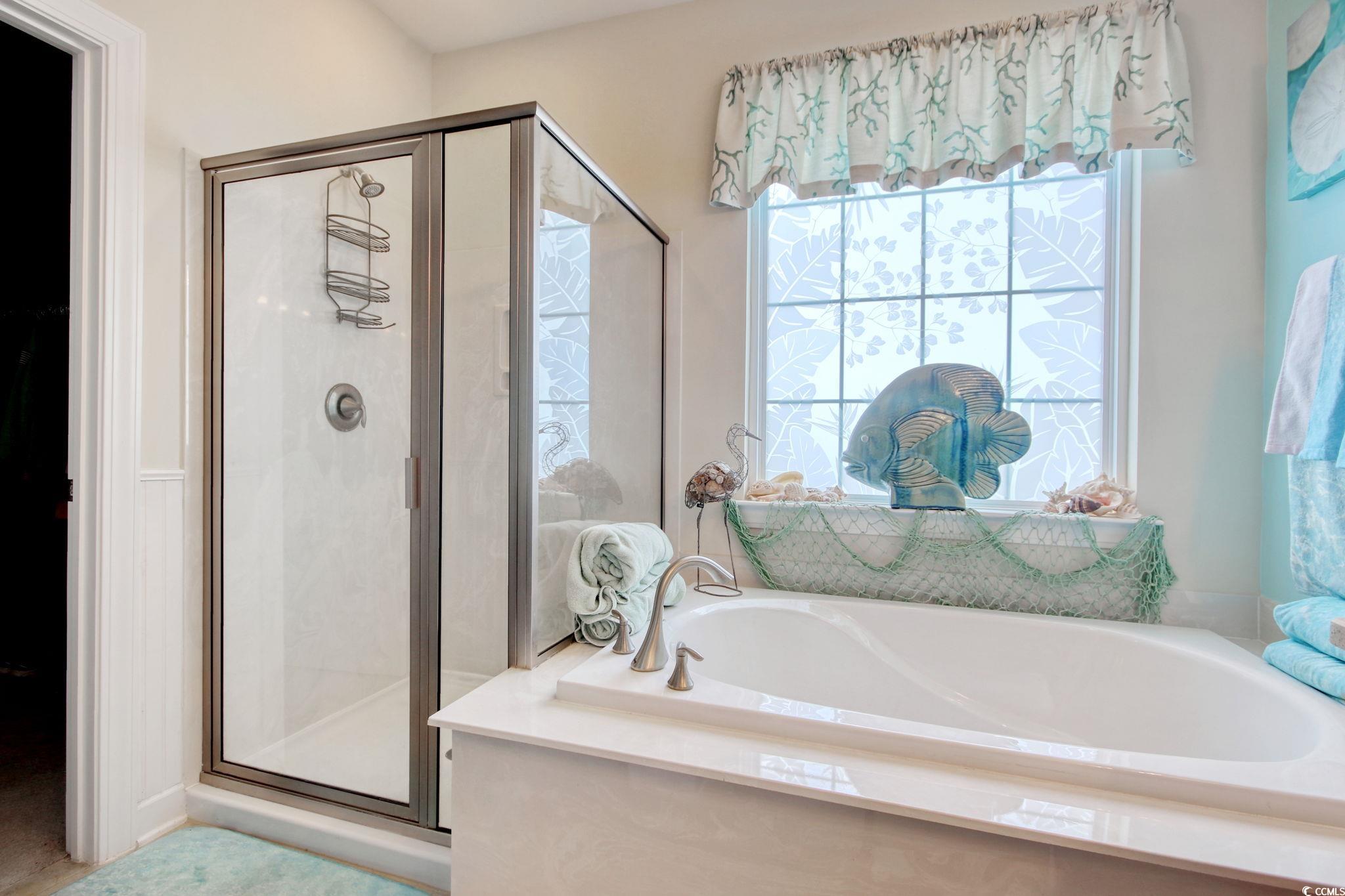 1878 Heritage Loop Myrtle Beach, SC 29577 - Photo 28 of 40 Bathroom with a stall shower and a bath