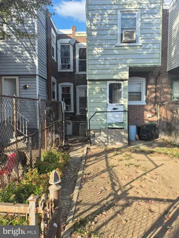 a view of a room with gym equipment and a large window