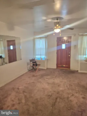 a view of a livingroom with a chandelier