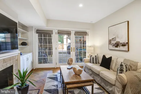 a kitchen with stainless steel appliances kitchen island granite countertop a sink and cabinets