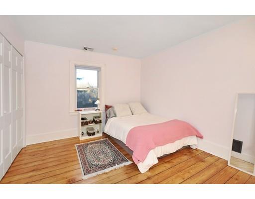 21 Sandy Pond Road Concord, MA 01742 - Photo 11 of 20 a bedroom with a bed and a window