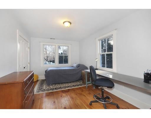 21 Sandy Pond Road Concord, MA 01742 - Photo 14 of 20 a living room with furniture and a window