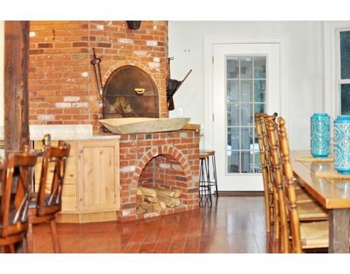21 Sandy Pond Road Concord, MA 01742 - Photo 5 of 20 a view of living room with furniture and wooden floor
