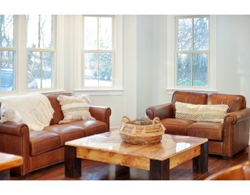 21 Sandy Pond Road Concord, MA 01742 - Photo 6 of 20 a living room with furniture and a large window