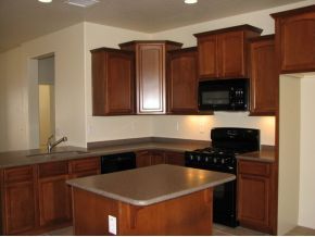1185 Rusty Nail Road Prescott Valley, AZ 86314 - Photo 12 of 12 a kitchen with stainless steel appliances granite countertop a sink stove and microwave