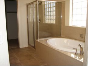 1185 Rusty Nail Road Prescott Valley, AZ 86314 - Photo 8 of 12 a bathroom with a tub and shower