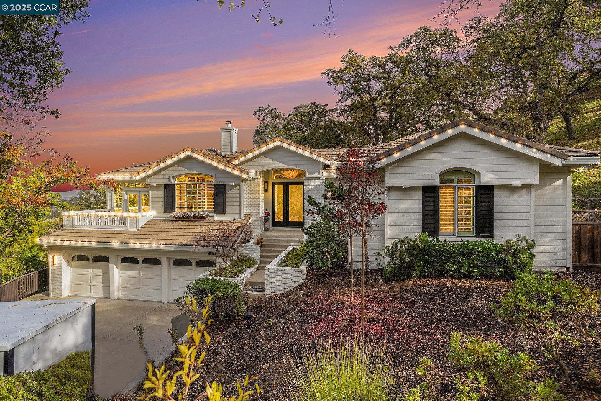 2199 Hidden Pond Road Lafayette, CA 94549 - Photo 1 of 40 a front view of a house with a yard