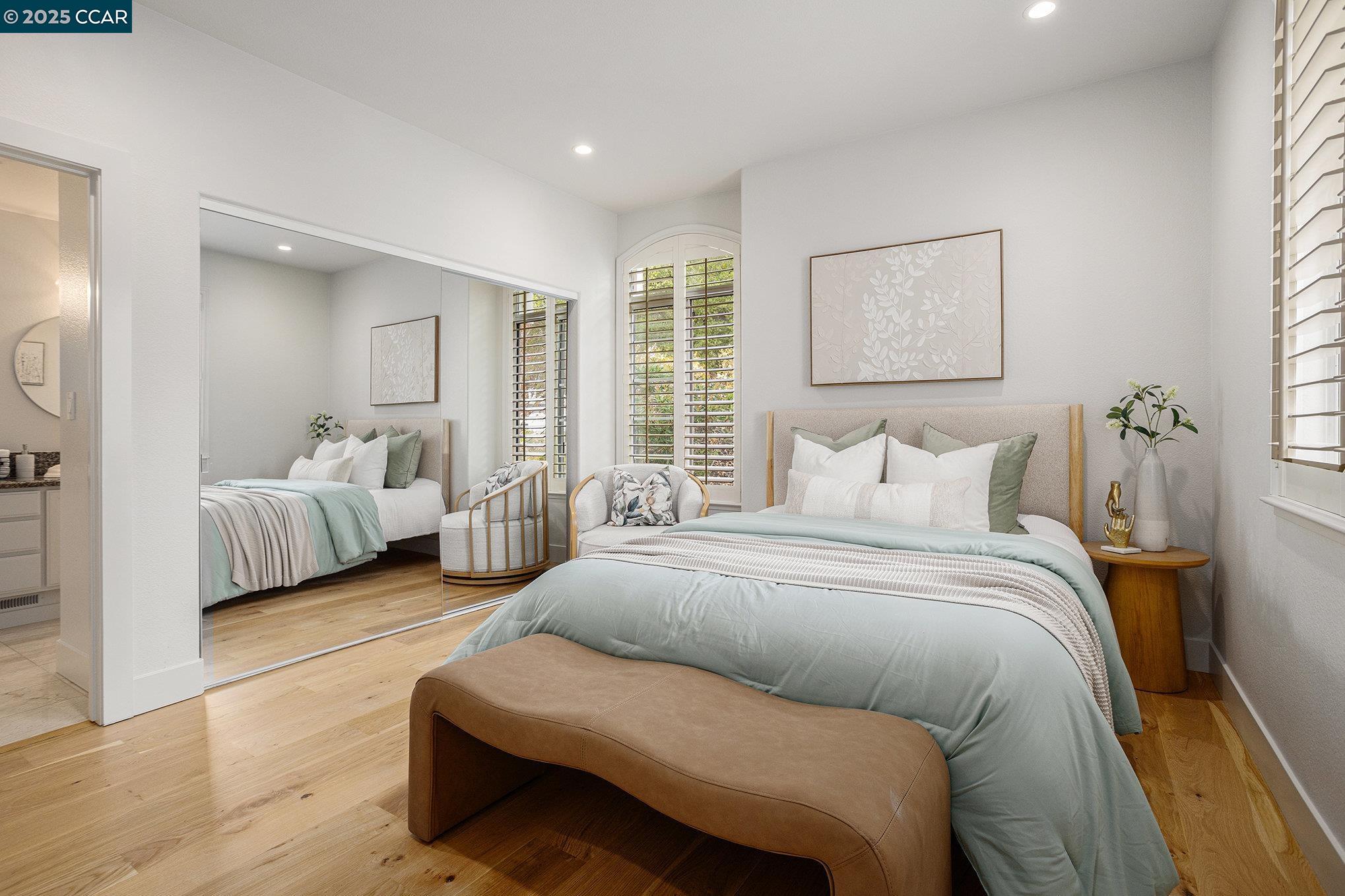 2199 Hidden Pond Road Lafayette, CA 94549 - Photo 16 of 40 a spacious bedroom with a bed and a couch