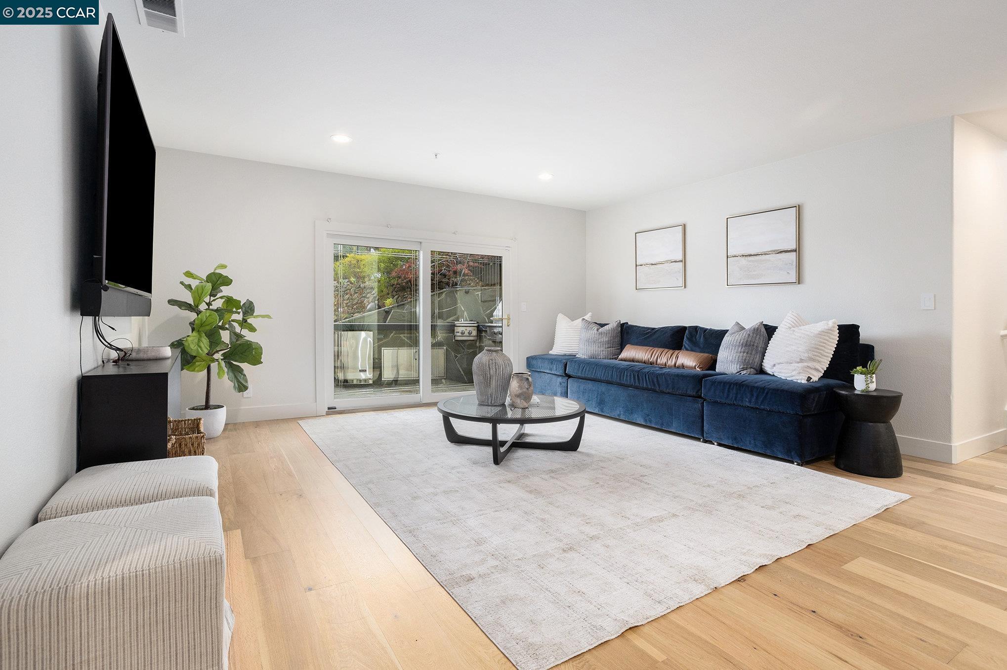 2199 Hidden Pond Road Lafayette, CA 94549 - Photo 21 of 40 a living room with furniture and a potted plant