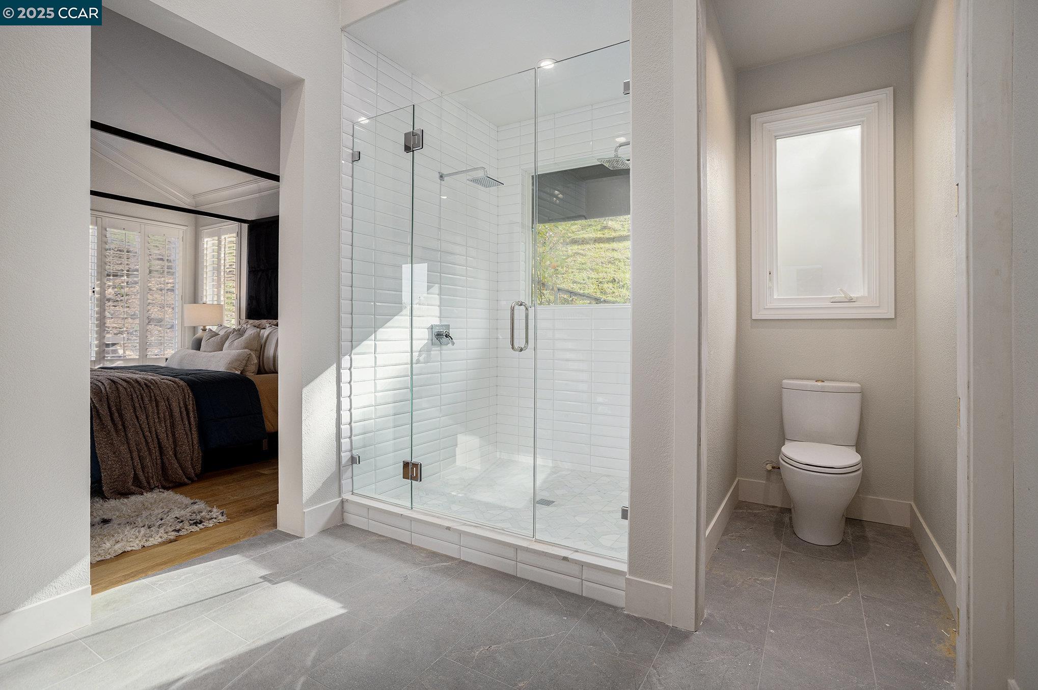 2199 Hidden Pond Road Lafayette, CA 94549 - Photo 28 of 40 a bathroom with a toilet and a shower