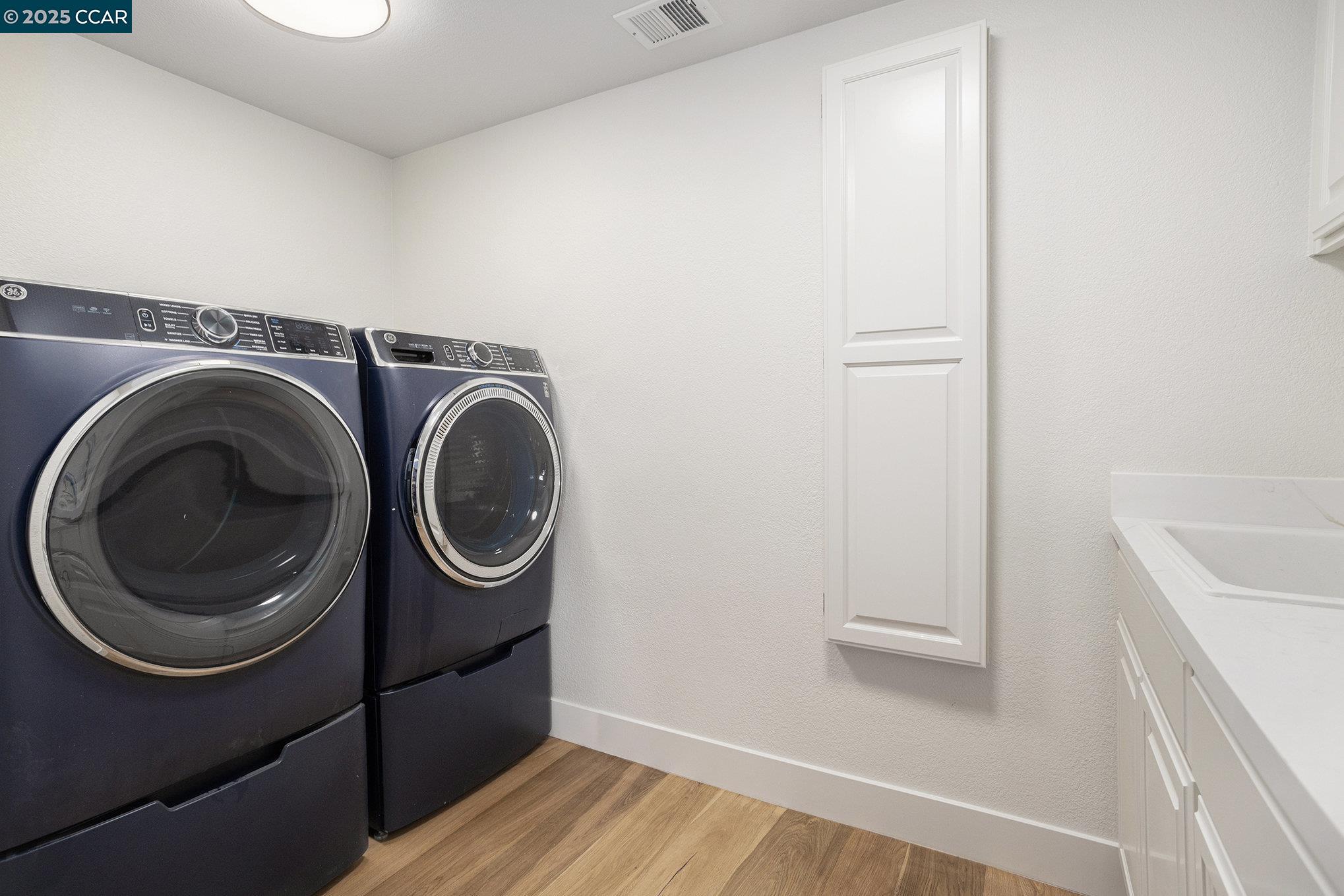 2199 Hidden Pond Road Lafayette, CA 94549 - Photo 31 of 40 a utility room with dryer and washer