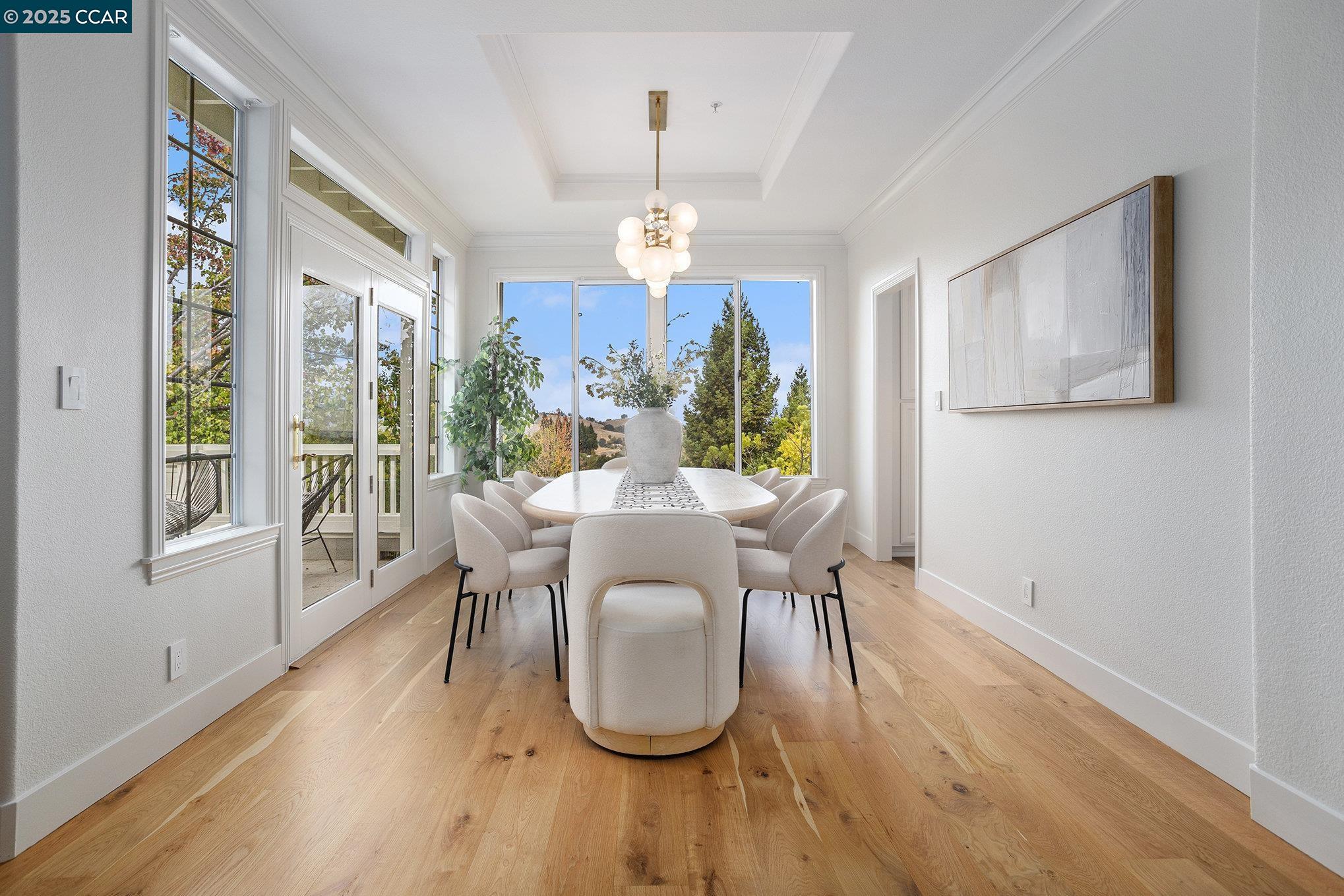 2199 Hidden Pond Road Lafayette, CA 94549 - Photo 7 of 40 a view of a dining room with furniture window and wooden floor