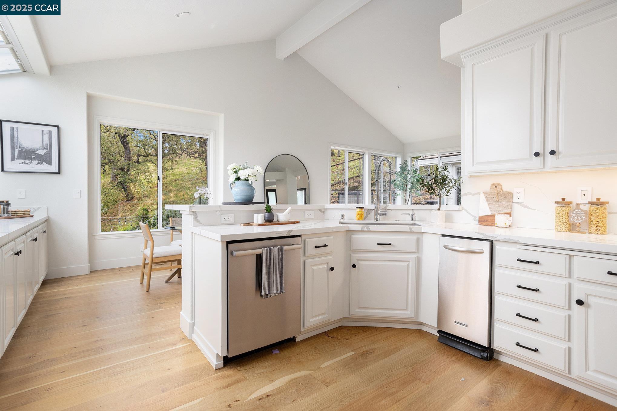 2199 Hidden Pond Road Lafayette, CA 94549 - Photo 10 of 40 a kitchen with sink cabinets and wooden floor