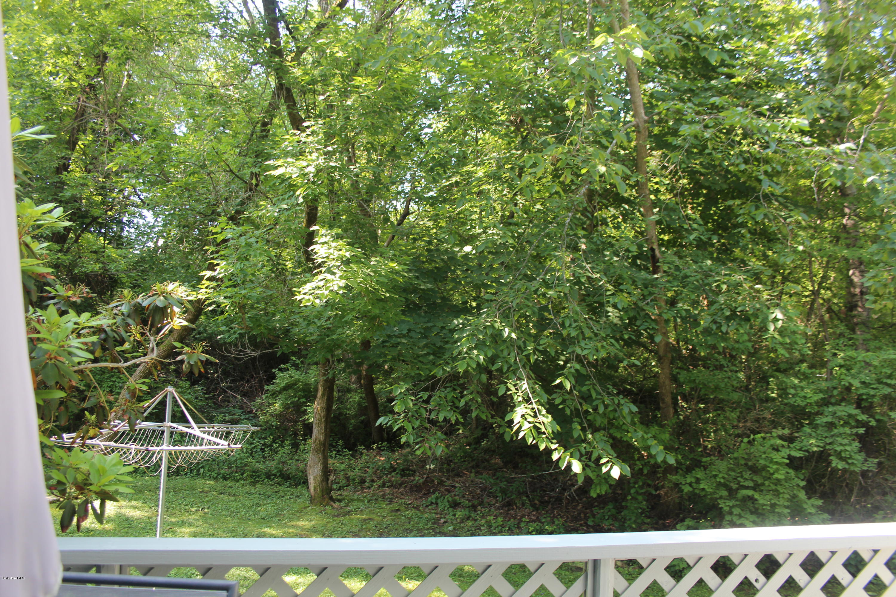 105 Cadwell Road, Unit 105 Pittsfield, MA 01201 - Photo 19 of 23 Woods Back yard