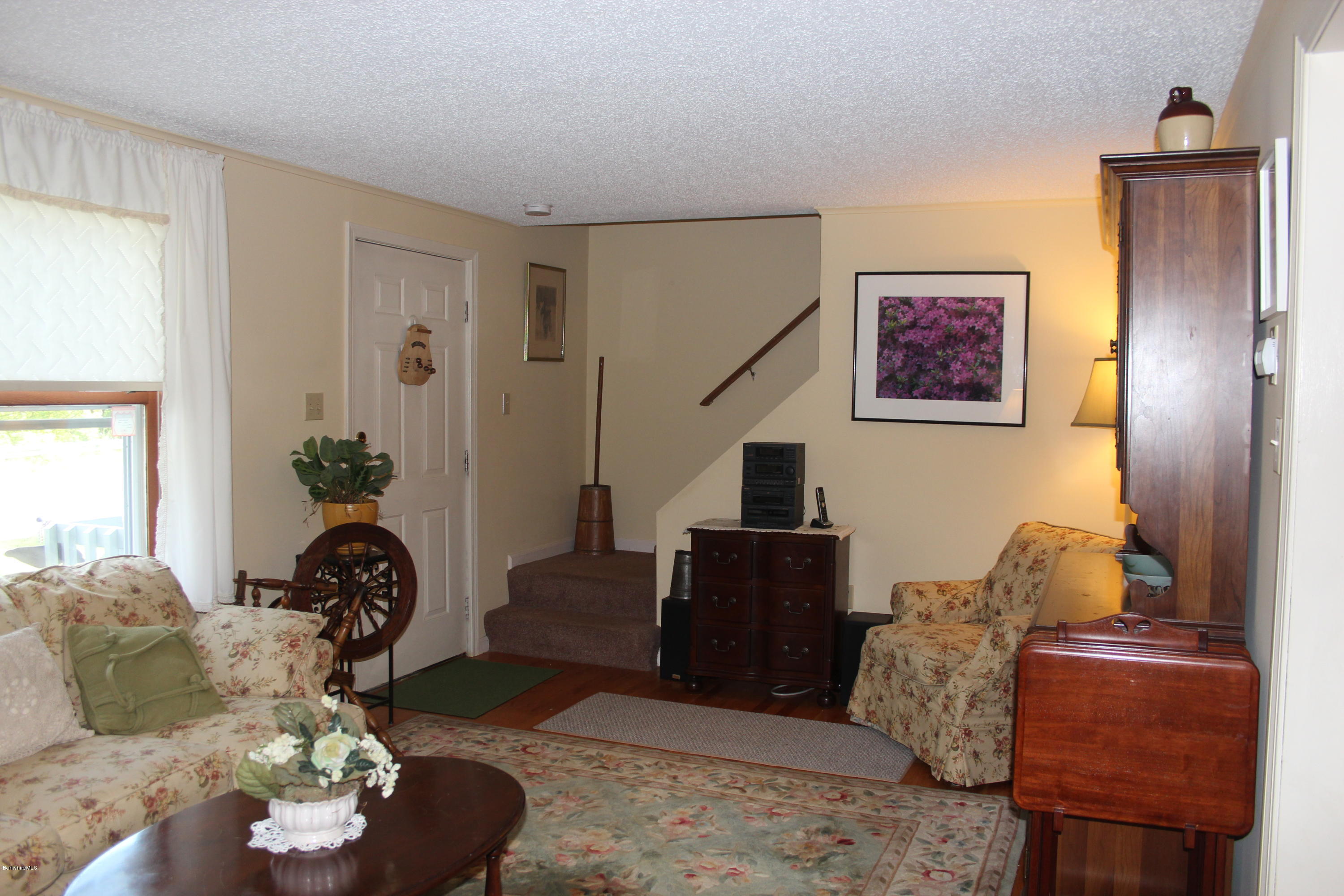 105 Cadwell Road, Unit 105 Pittsfield, MA 01201 - Photo 4 of 23 Living Room to Stairs
