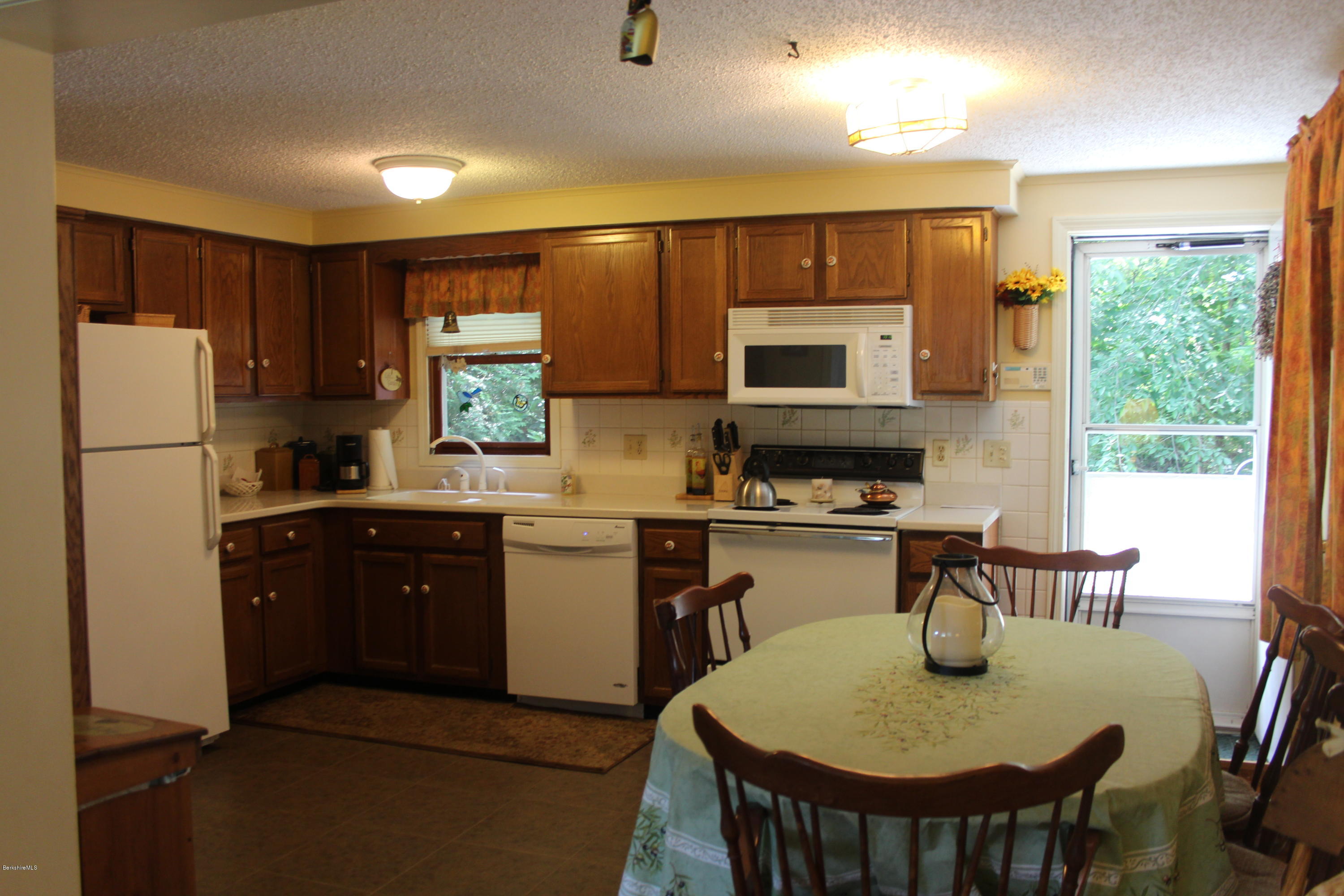 105 Cadwell Road, Unit 105 Pittsfield, MA 01201 - Photo 6 of 23 Open to Deck & Living Room