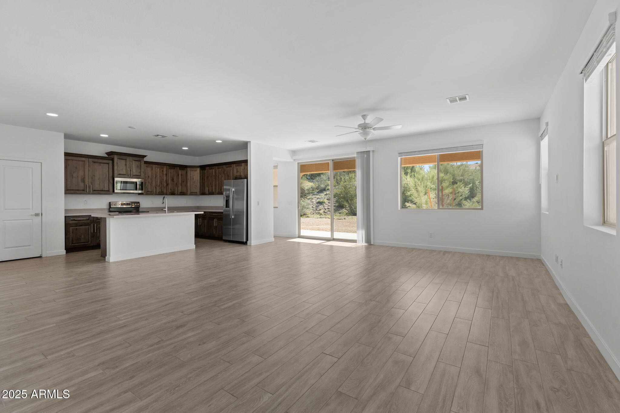 1985 West Ringo Road Wickenburg, AZ 85390 - Photo 6 of 25 a view of a kitchen with a sink and a window