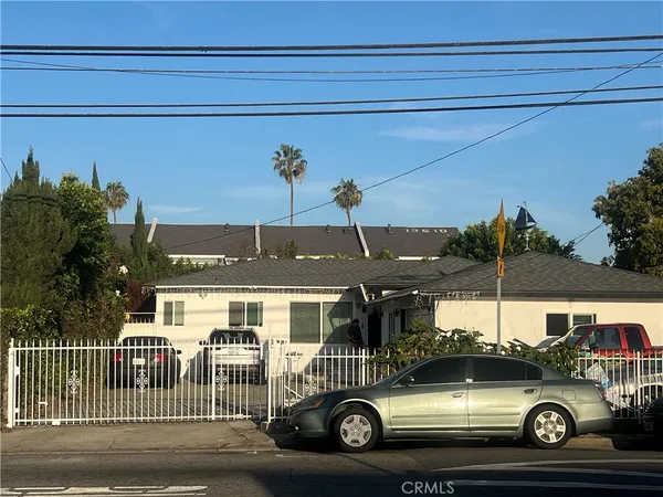 a car parked in front of a house