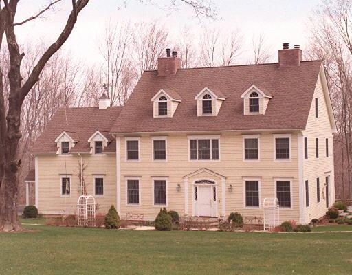 197 Signal Hill Road Wilton, CT 06897 - Photo 1 of 1 a front view of a house with garden