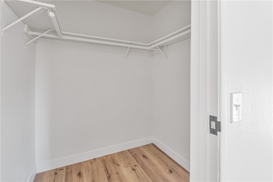 7046 Seventh Avenue Hesperia, CA 92345 - Photo 28 of 46 a view of an empty walk in closet