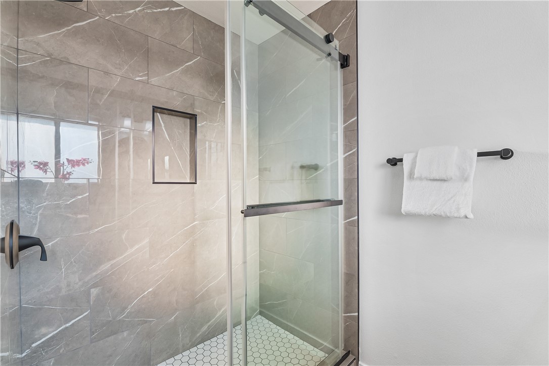 7046 Seventh Avenue Hesperia, CA 92345 - Photo 30 of 46 a bathroom with a shower