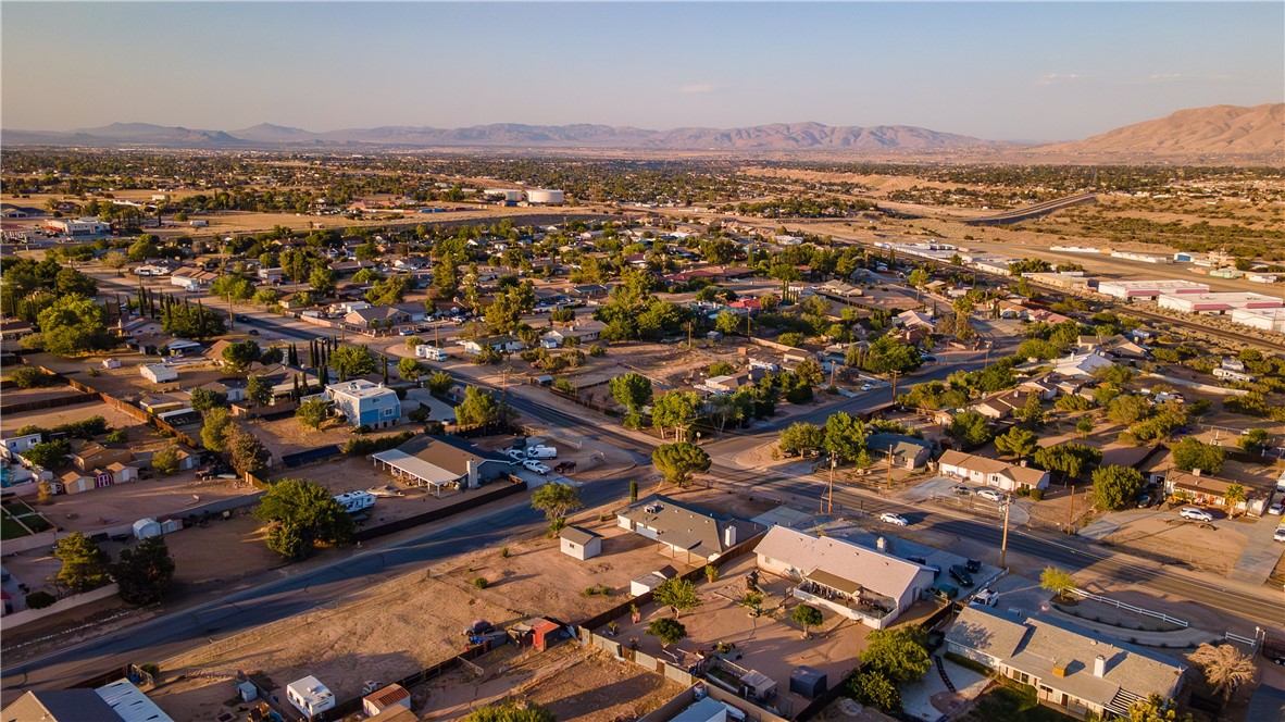 7046 Seventh Avenue Hesperia, CA 92345 - Photo 43 of 46 an aerial view of residential houses with outdoor space