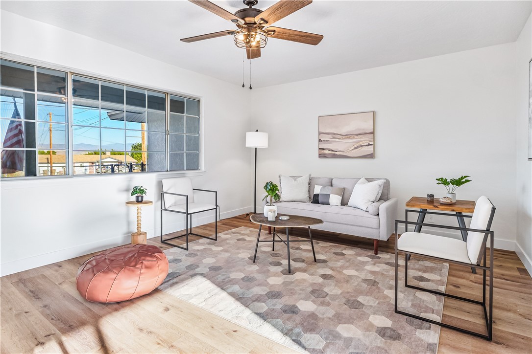 7046 Seventh Avenue Hesperia, CA 92345 - Photo 9 of 46 a living room with furniture and window