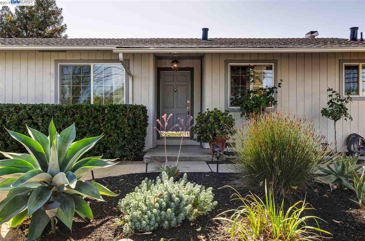 1572 Ayers Road Concord, CA 94521 - Photo 1 of 1 a front view of a house with a yard