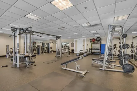 a view of a room with gym equipment