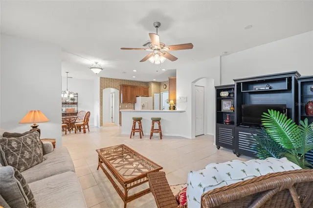 a bedroom with furniture and a chandelier