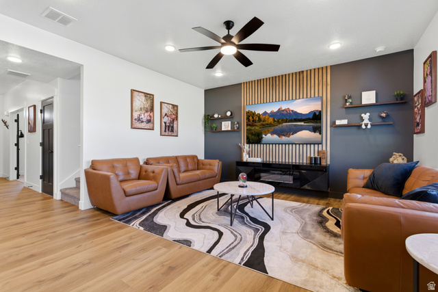 3902 West 825 North West Point, UT 84015 - Photo 25 of 49 Living area with wood finished floors, a ceiling fan, and recessed lighting