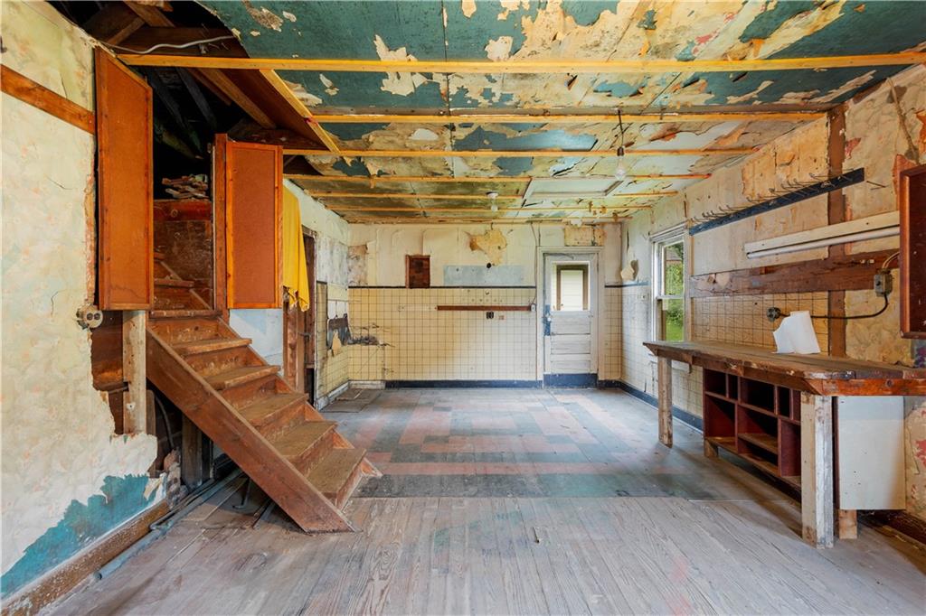 6611 Library Road South Park, PA 15129 - Photo 25 of 41 The workshop has more storage up the steps.